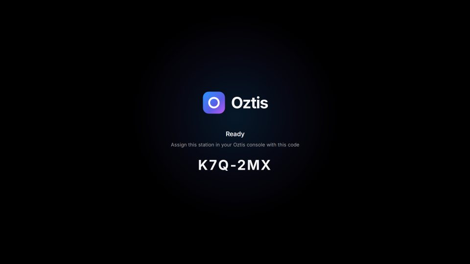 Station screen after enrollment: “Ready. Assign this station in your Oztis console with this code”, followed by a short code.